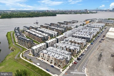 Experience modern riverfront living at its finest in one of - photo 44