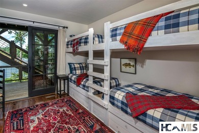 On the shores of Lake Glenville, Deer Run Cottage emerges as - photo 46
