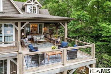 On the shores of Lake Glenville, Deer Run Cottage emerges as - photo 48