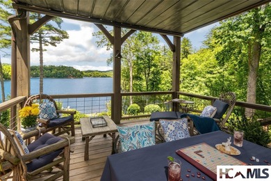 On the shores of Lake Glenville, Deer Run Cottage emerges as - photo 50