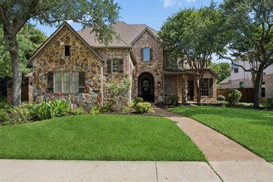 Nestled on a premium corner lot in the prestigious Bridlewood - photo 1