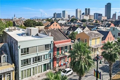Direct French Quarter Gateway: Rare 3-Bedroom Loft Overlooking