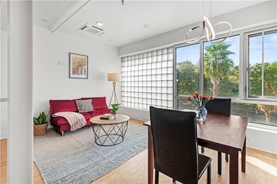 Direct French Quarter Gateway: Rare 3-Bedroom Loft Overlooking