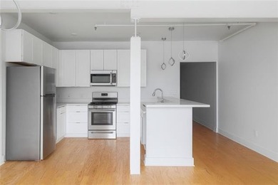 Direct French Quarter Gateway: Rare 3-Bedroom Loft Overlooking