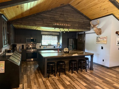This stunning 3-bedroom, 2-bathroom lakefront retreat is the - photo 35