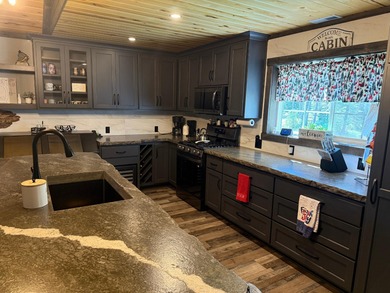 This stunning 3-bedroom, 2-bathroom lakefront retreat is the - photo 37
