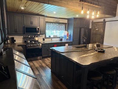This stunning 3-bedroom, 2-bathroom lakefront retreat is the - photo 38