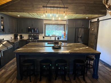 This stunning 3-bedroom, 2-bathroom lakefront retreat is the - photo 39