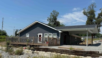 Lake Home For Sale in Gilbertsville, Kentucky