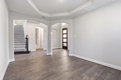**$10,000 TOWARDS CLOSING COSTS!** Experience luxury living in - photo 3