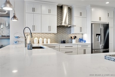 Welcome to Unit 3G at Cypress at the Lake, where refined luxury