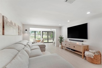 This Boca Lago Villa is completely renovated in every way and