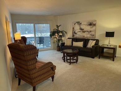 New carpet- fresh paint! Great views from this 3rd floor unit! - photo 2