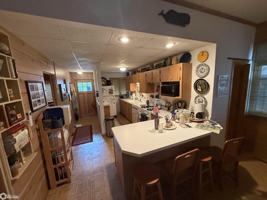 Cozy 2-bedroom lakefront cabin with 50 feet of frontage. This is - photo 8