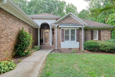 Discover this stunning custom-built home on Lake Cooley