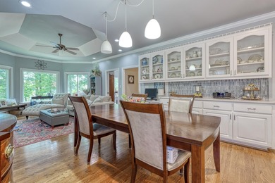 Discover this stunning custom-built home on Lake Cooley