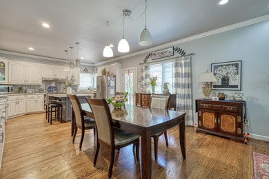 Discover this stunning custom-built home on Lake Cooley