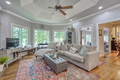 Discover this stunning custom-built home on Lake Cooley