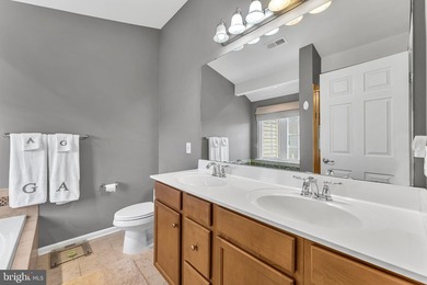 Welcome to this beautifully maintained end-unit townhome in the - photo 18