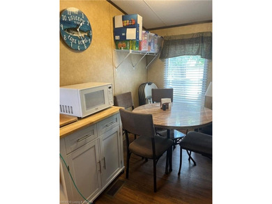 Welcome to your lake retreat in Stigler, Oklahoma. This - photo 21