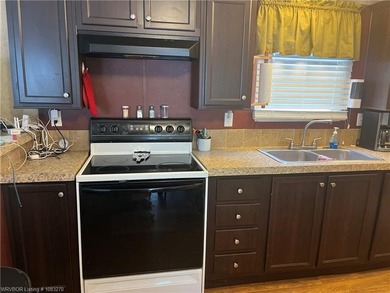 Welcome to your lake retreat in Stigler, Oklahoma. This - photo 23