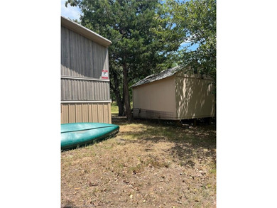 Welcome to your lake retreat in Stigler, Oklahoma. This - photo 50