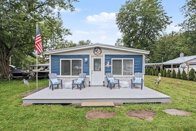 This charming 2-bedroom, 1-bath cottage in Bangor offers access - photo 1