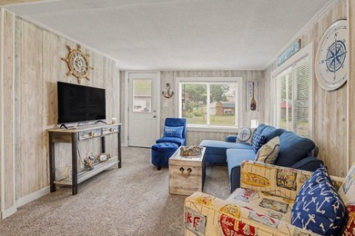 This charming 2-bedroom, 1-bath cottage in Bangor offers access - photo 3