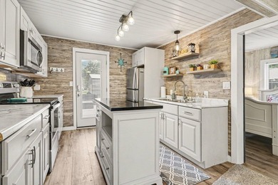 This charming 2-bedroom, 1-bath cottage in Bangor offers access - photo 9