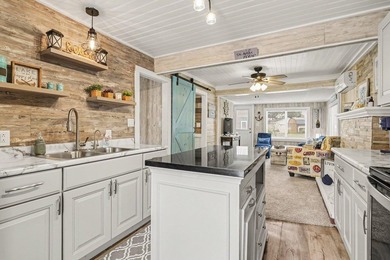 This charming 2-bedroom, 1-bath cottage in Bangor offers access - photo 10
