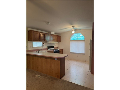 MOVE-IN READY! OWNED LAND and NO HOA! Welcome to this