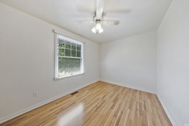 Enjoy lake views and flexible living space in this charming - photo 12