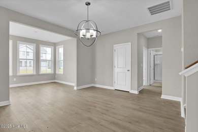 The Edisto is a two-story home featuring five bedrooms and three - photo 14