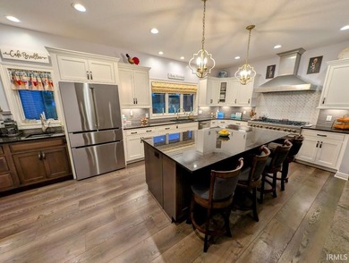 Welcome to a private, custom-built estate on 7.5 scenic acres in