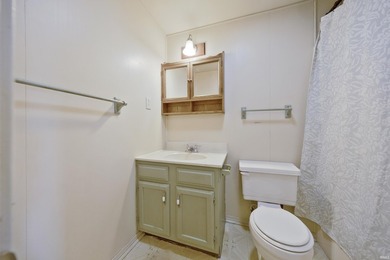 Enjoy lake views and flexible living space in this charming - photo 15