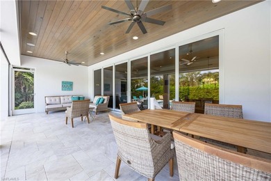 THIS TURNKEY FURNISHED HOME BOAST A .56 ACRE LOT. This Manicured - photo 18