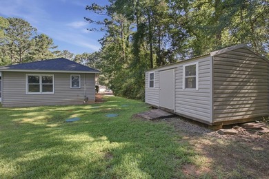 Quaint country living with this remodeled 4BR 2BA home sitting - photo 3