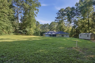 Quaint country living with this remodeled 4BR 2BA home sitting - photo 4