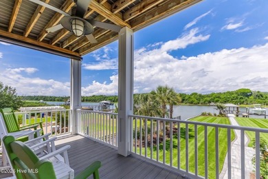Experience the very best of coastal waterfront living along the - photo 11
