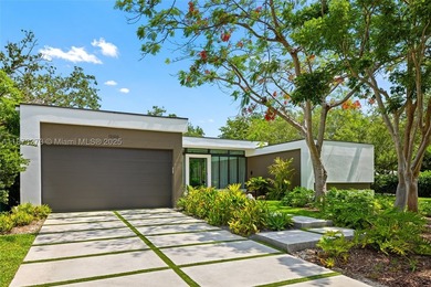 Set on a 39,639 sqft corner lot, this 2023 modern estate offers - photo 12