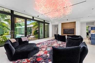 Set on a 39,639 sqft corner lot, this 2023 modern estate offers - photo 16