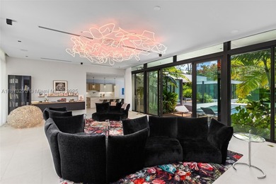 Set on a 39,639 sqft corner lot, this 2023 modern estate offers - photo 17