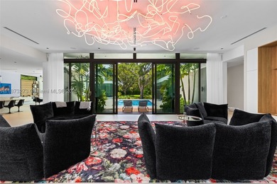 Set on a 39,639 sqft corner lot, this 2023 modern estate offers - photo 18