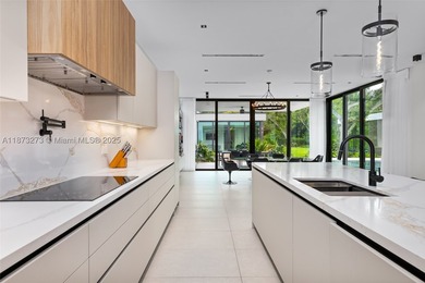 Set on a 39,639 sqft corner lot, this 2023 modern estate offers - photo 25