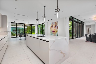 Set on a 39,639 sqft corner lot, this 2023 modern estate offers - photo 26