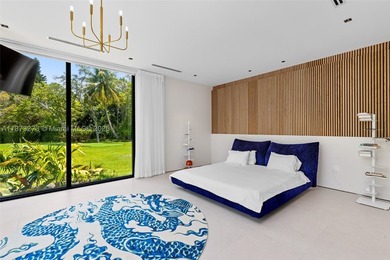Set on a 39,639 sqft corner lot, this 2023 modern estate offers - photo 32