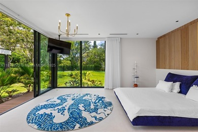 Set on a 39,639 sqft corner lot, this 2023 modern estate offers - photo 33