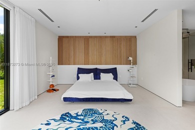 Set on a 39,639 sqft corner lot, this 2023 modern estate offers - photo 34