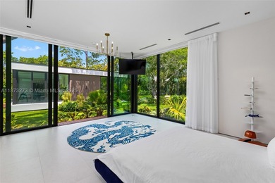Set on a 39,639 sqft corner lot, this 2023 modern estate offers - photo 35