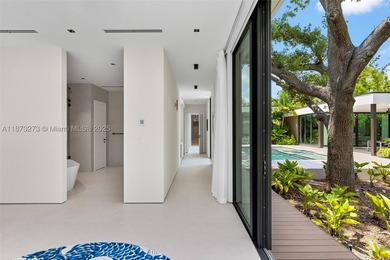Set on a 39,639 sqft corner lot, this 2023 modern estate offers - photo 36